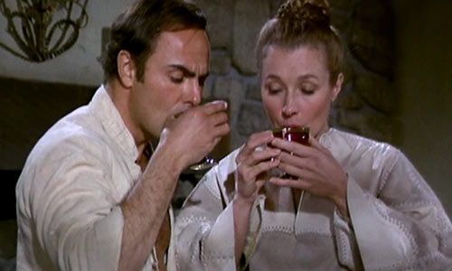 Hunt and Marg drink wine
