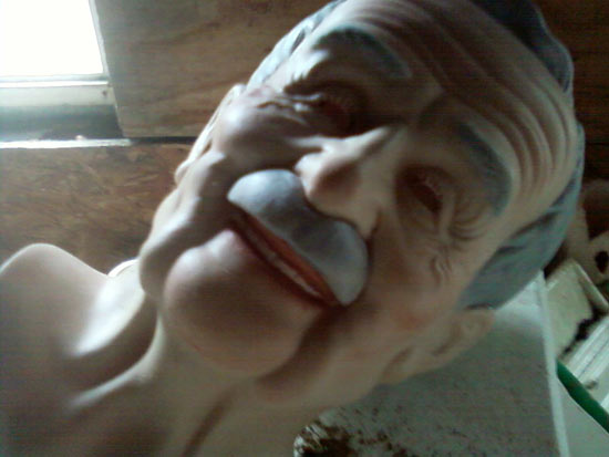 laughing elderly man doll