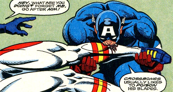 Captain America sucking poison from SuperPro's leg