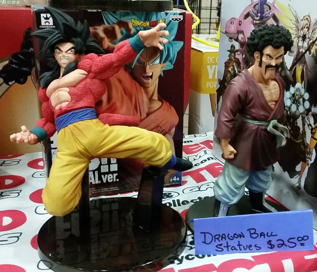 Super Saiyan 4 Goku and Mr. Satan statues