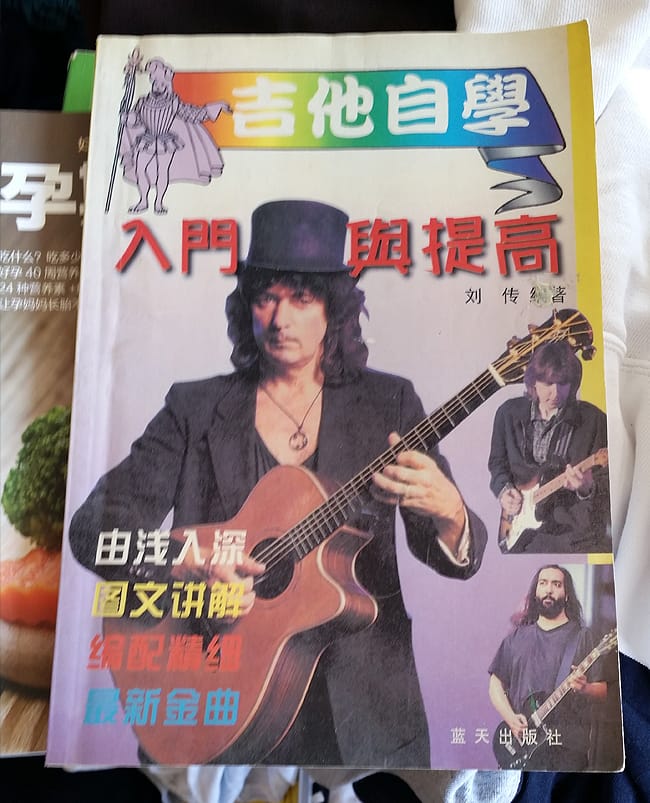 Music book with strange men on the cover