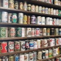 Bookshelf full of empty beer cans