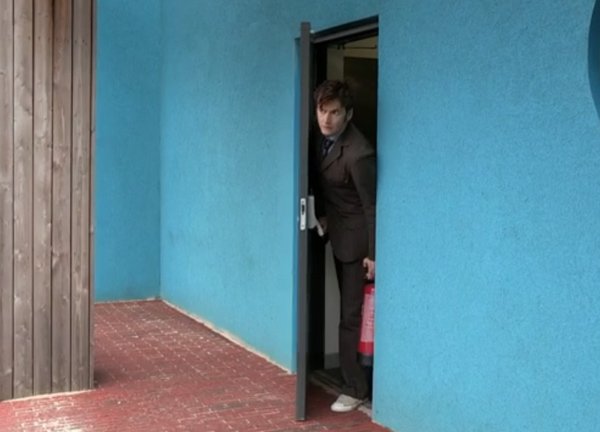 David Tennant opening door